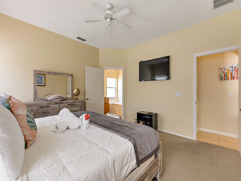 King Master Suite with large tub and separate shower.