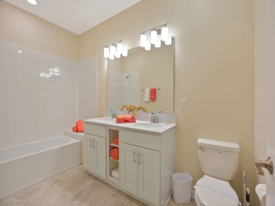 Bathroom with wide mirror