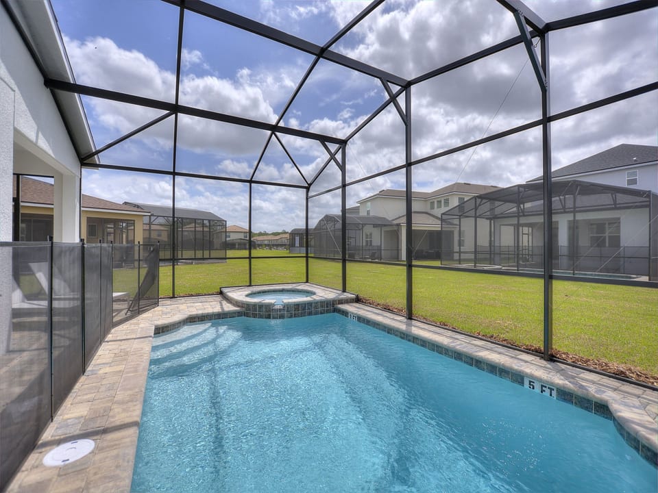 Private swimming pool with spa
