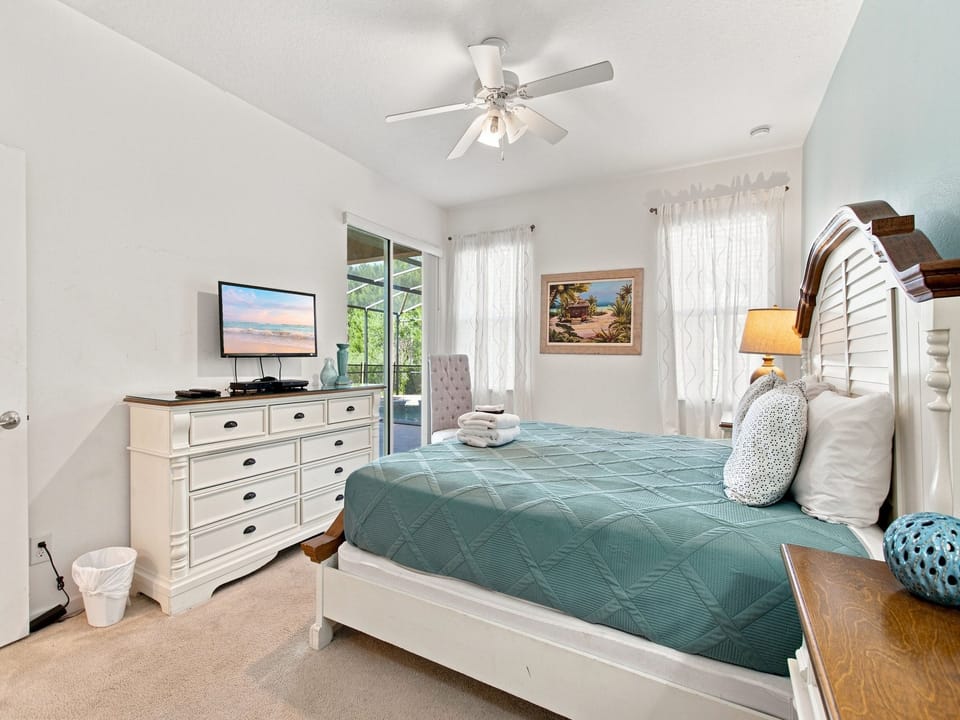 Extended lanai, several loungers and a 6 person patio set!