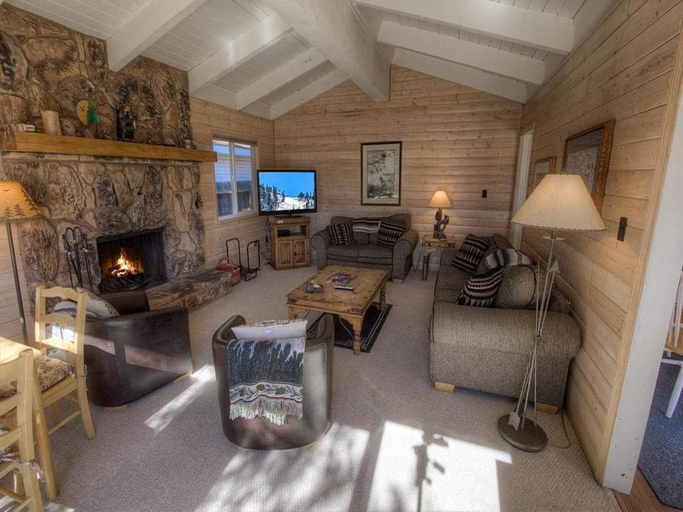 Living Room with Wood Burning Fireplace