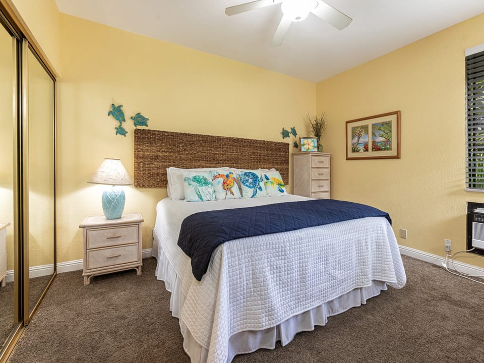 Serene bedroom with king bed and calming tropical accents