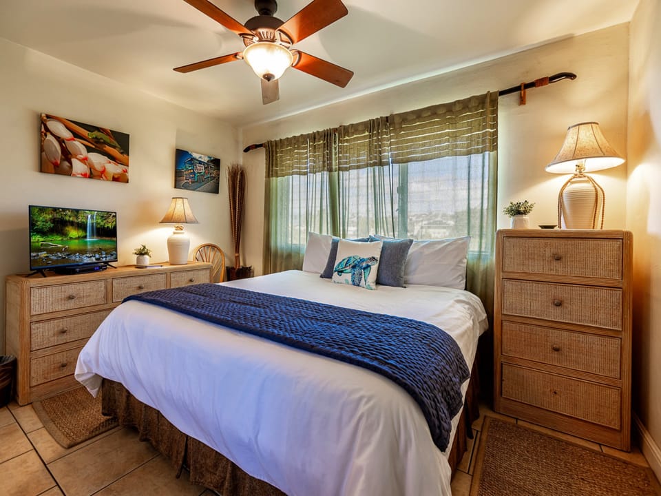Comfortable King bed and TV in bedroom