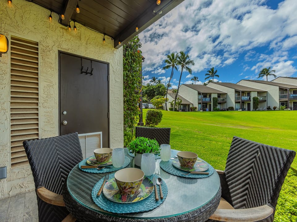 Private lanai offers ocean views and seating for four