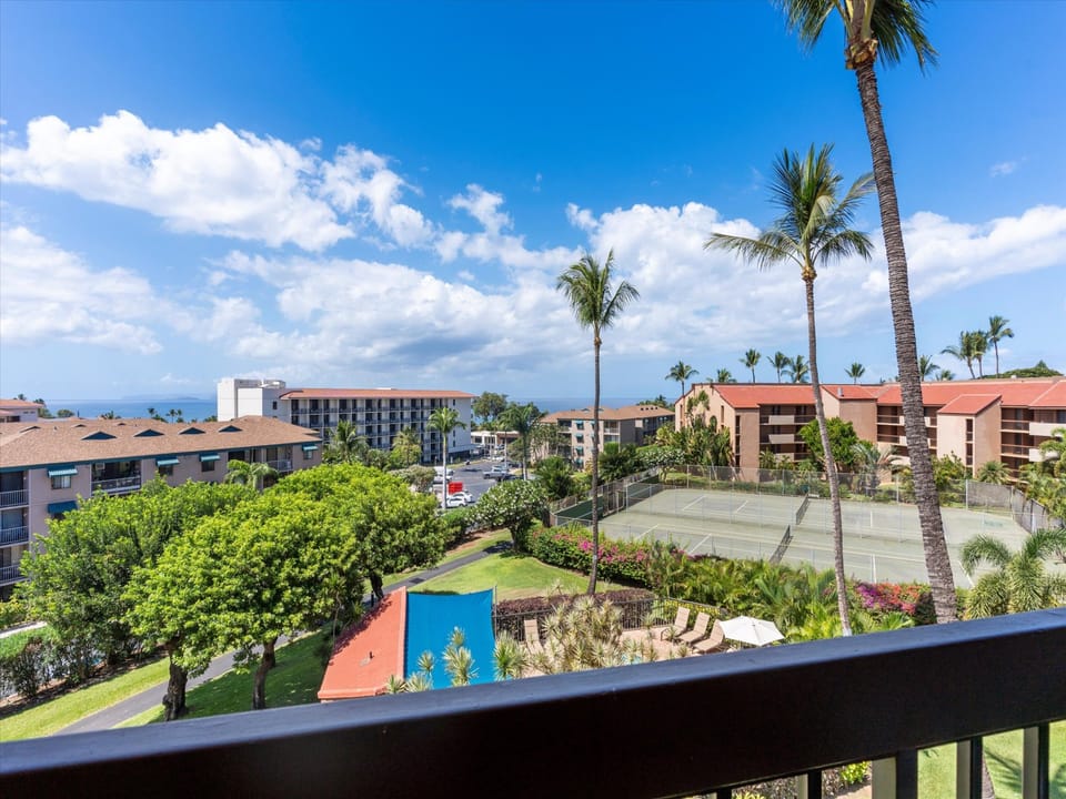 Watch guests play tennis from the patio