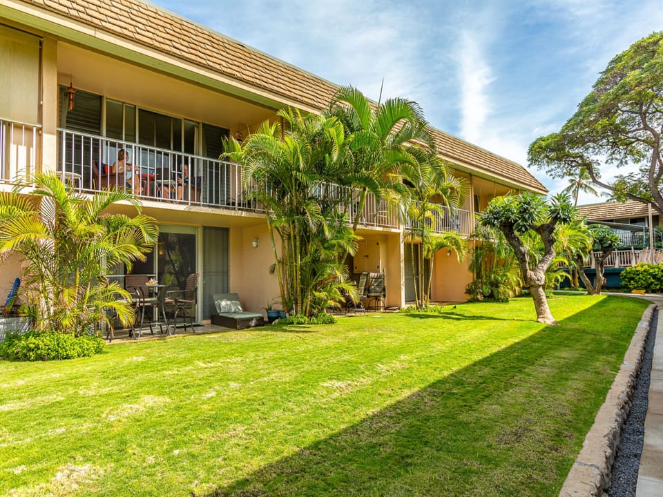 Relax and enjoy the ground floor lanai (on the left).