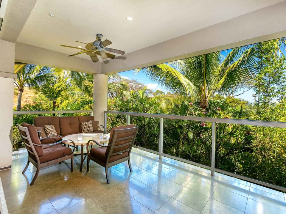 Relax on Upper Lanai Furniture Enjoying Lush Tropical Area