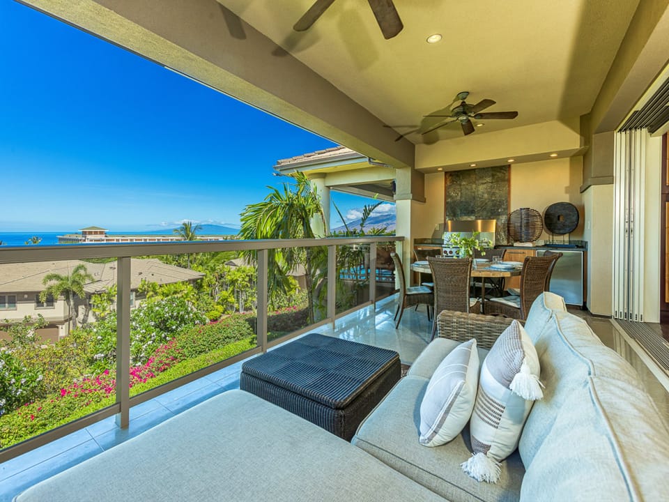 Soak in sweeping ocean views from your private lanai, where ceiling fans keep you cool and cozy seating invites you to linger over tropical breezes and stunning blue horizons.