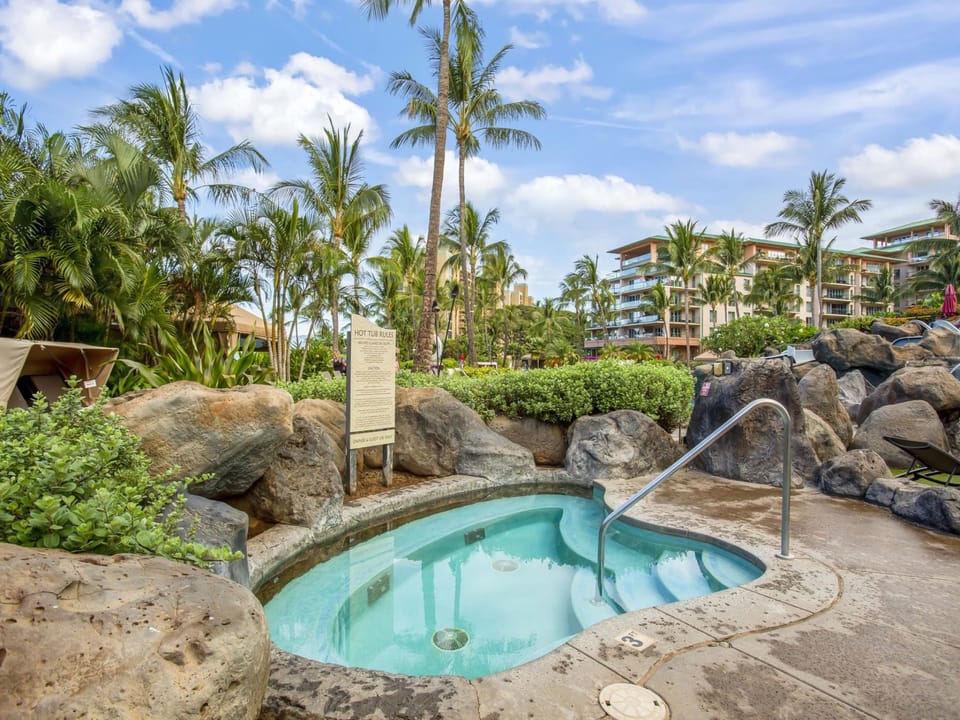Soak away the day's adventures in the resort's inviting hot tubs, surrounded by swaying palms and the soothing sounds of cascading waterfalls.