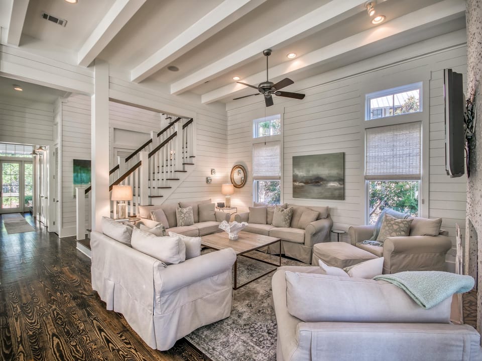 First Floor Living Room with Warm  Hard Wood Floors Throughout the Space