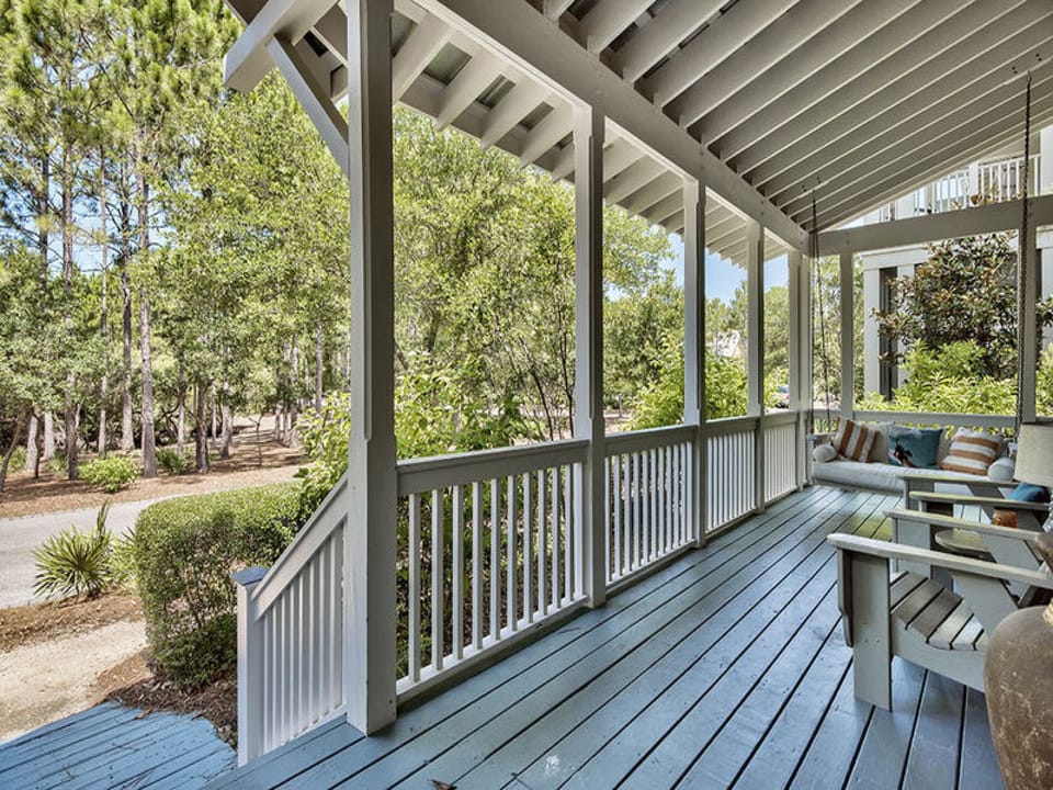 The front porch has a lovely swing and adirondack chairs-perfect for watching the kids ride their bikes