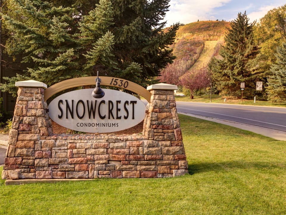 The exterior of Snowcrest Condominiums in the fall.