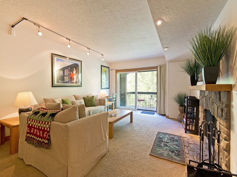 Warm wood burning fireplace - Park City Lodging-Park Station 147-Living Room