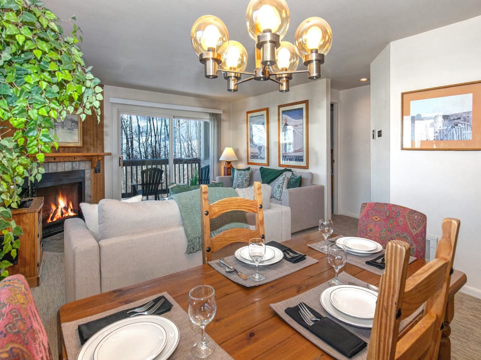 The dining table offers seating for four guests.