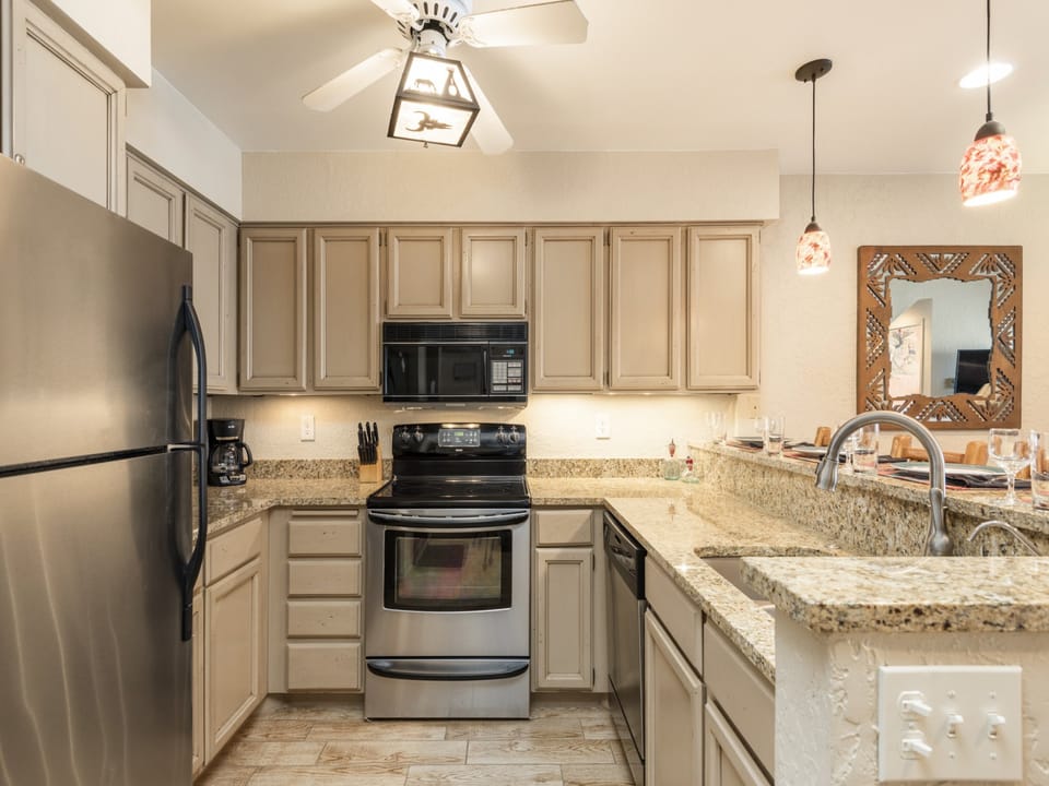 Fully equipped kitchen with stainless steel appliances