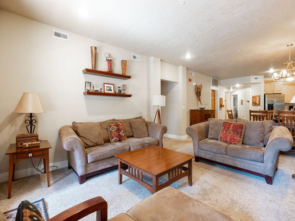 Abundant comfortable seating throughout livin groom
