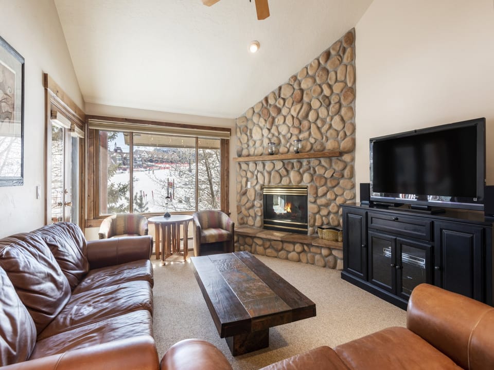 River rock fireplace in the living room