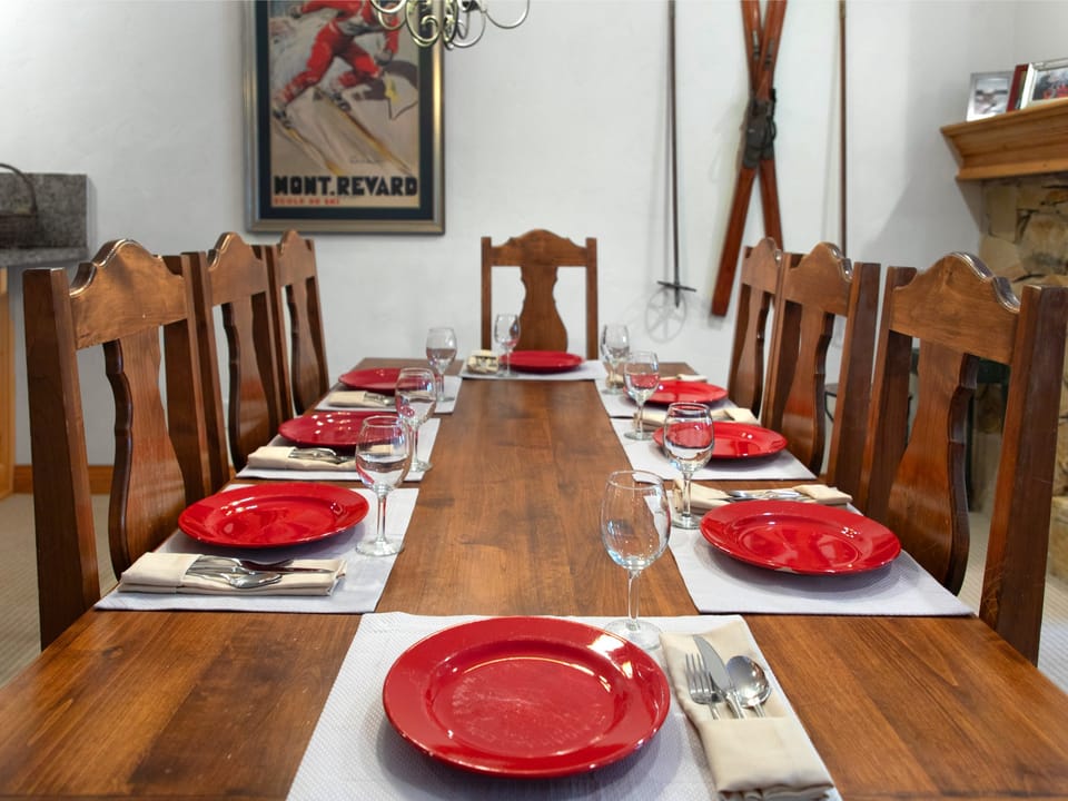 The wood dining table offers seating for 8.