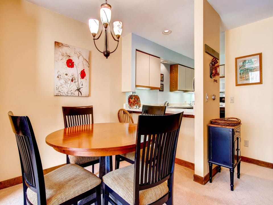 The dining room table and kitchen