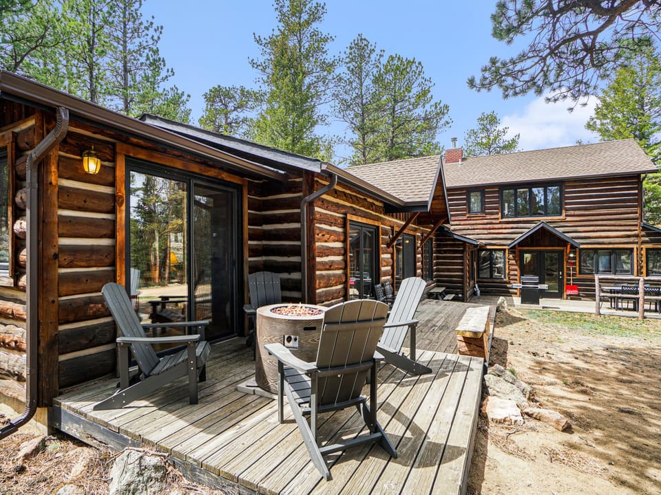 Back deck with seating and gas fire pit.