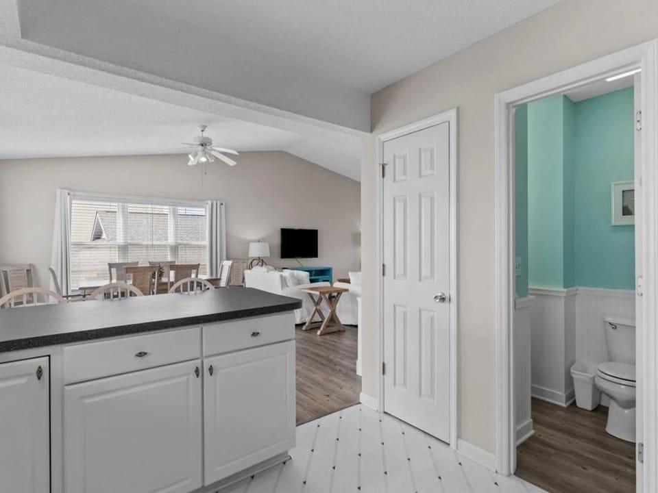 View From Kitchen to Dining Area and Bathroom