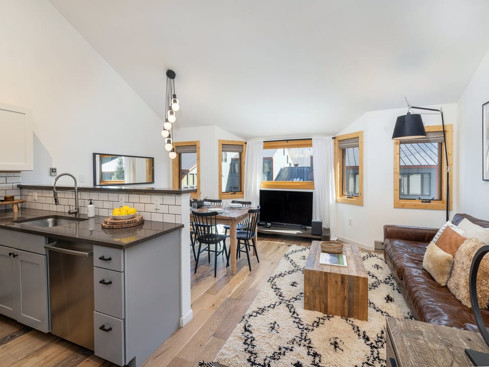 Lots of sunshine in this spacious living and kitchen area.