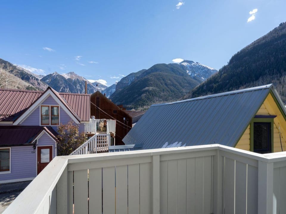 The deck offers views of Ajax and the surrounding box canyon.