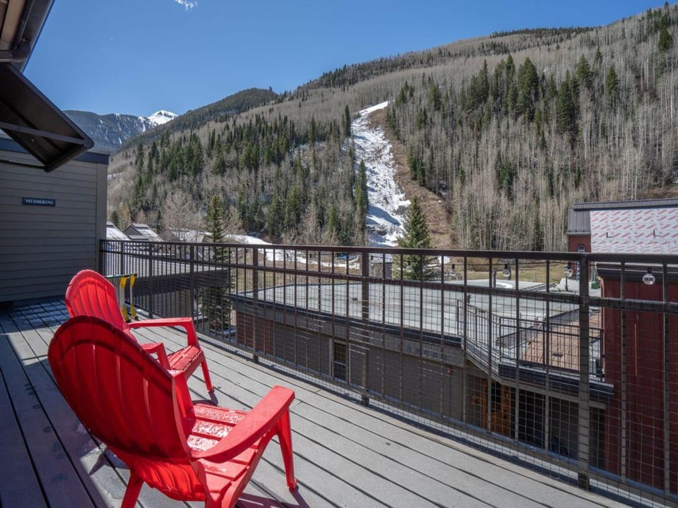 The mountains are calling from this deck of the primary bedroom