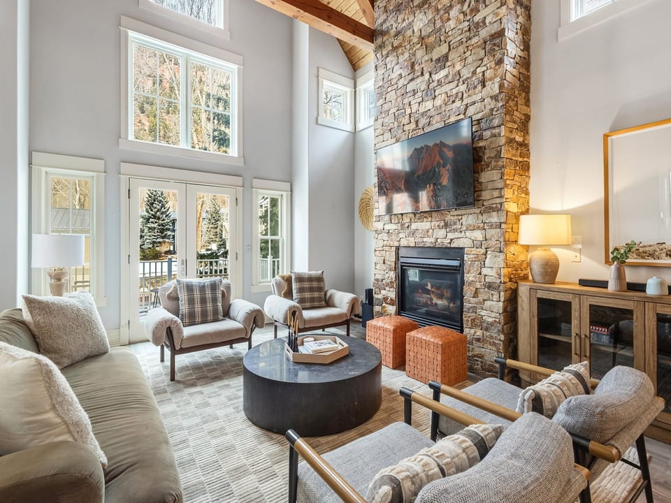 This multi-level luxury home boasts an open floor plan that offers the perfect space for gathering with family and friends.