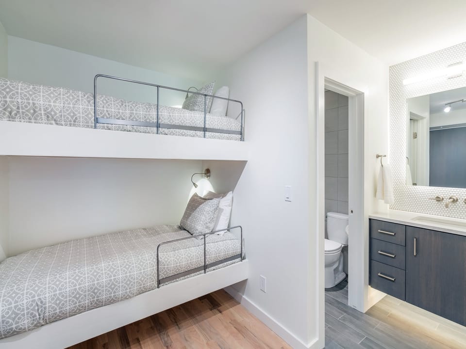 The custom bunk beds are full sized and are perfect for kids or extra friends.