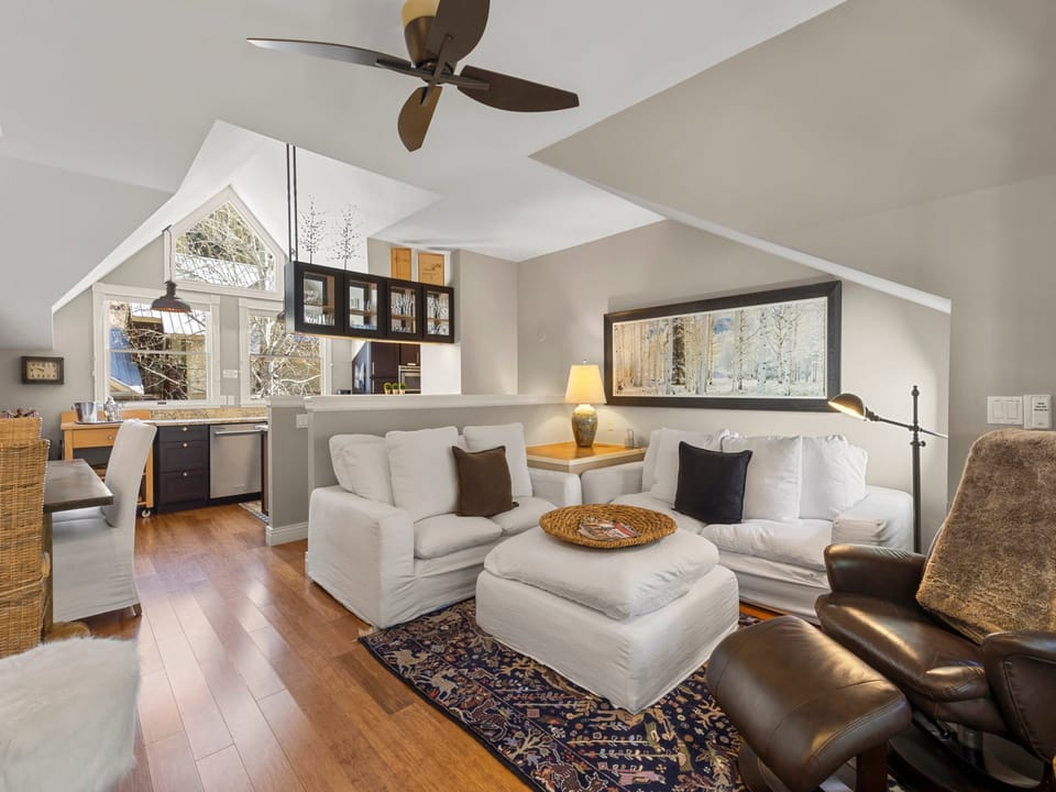 Multi-level Telluride condo featuring a private deck, garage parking, and unbeatable walkability to the Gondola, Main Street, dining, and River Trail for year-round convenience.