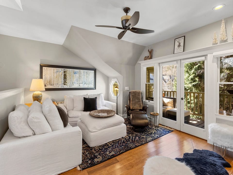 Cozy up on the softest couch ever and enjoy the warmth of the fireplace or kick back to watch your favorite movie.
