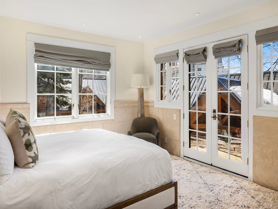 The Primary suite features King bed, ensuite bathroom and private patio area.