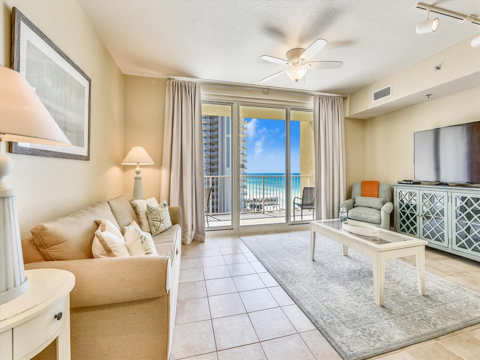 Living room with sleeper sofa and balcony access