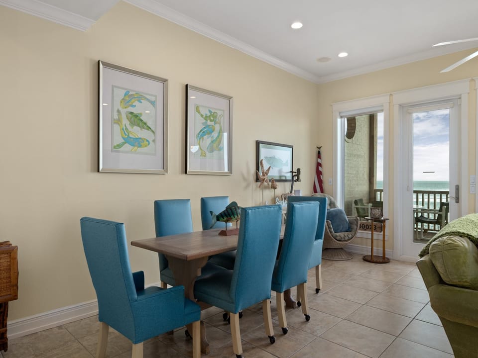 Ground-level dining area comfortably seats 6 guests