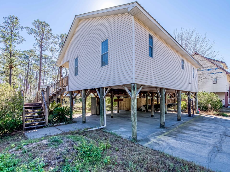 Covered parking is offered underneath or you can use the space for storing your toys