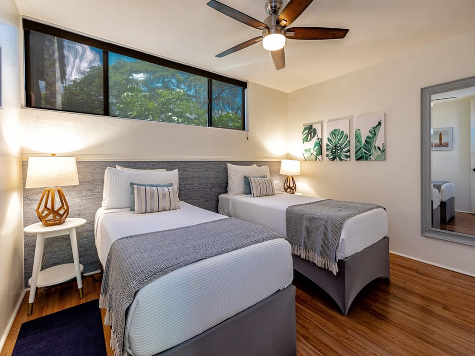 Guest twin beds convert into king size bed upon request.