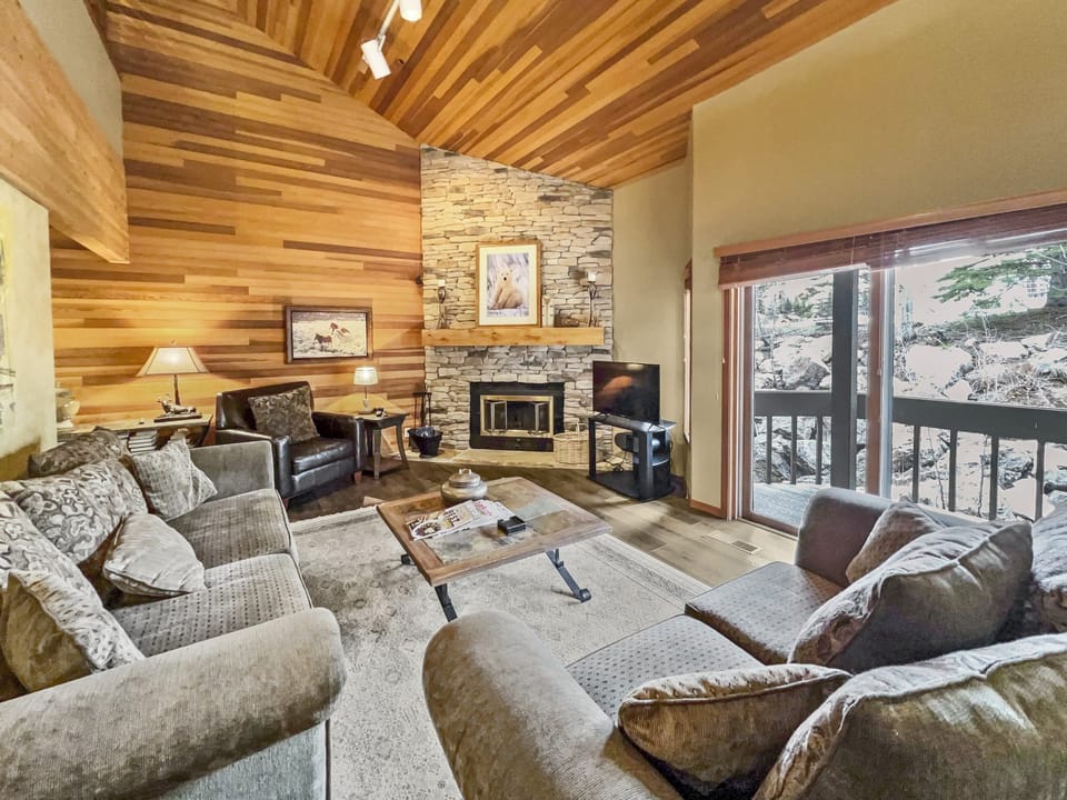 1791 Lakeside Getaway at Deer Valley! Outdoor Heated Pool &amp; Hot Tubs! - a SkyRun Park City Property - Cozy Living Room with Wood Burning Fireplace