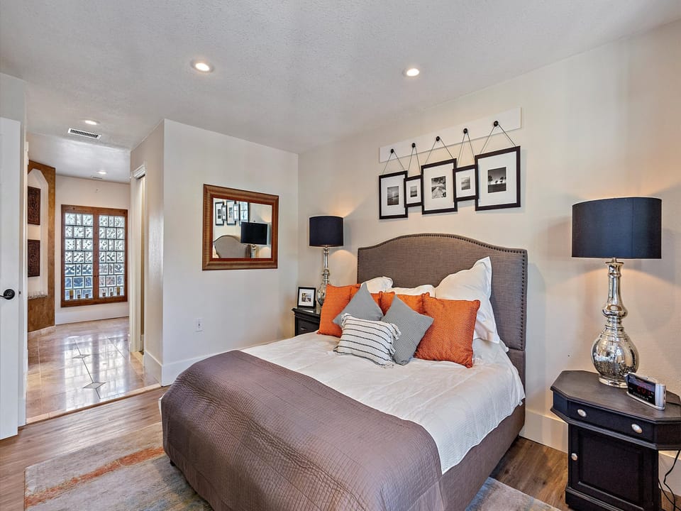 Master Bedroom Master Bedroom King size bed, night stands and access to backyard via french doors.