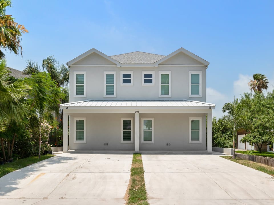 Welcome to newly constructed 209B W. Retama! Your townhome is on the right