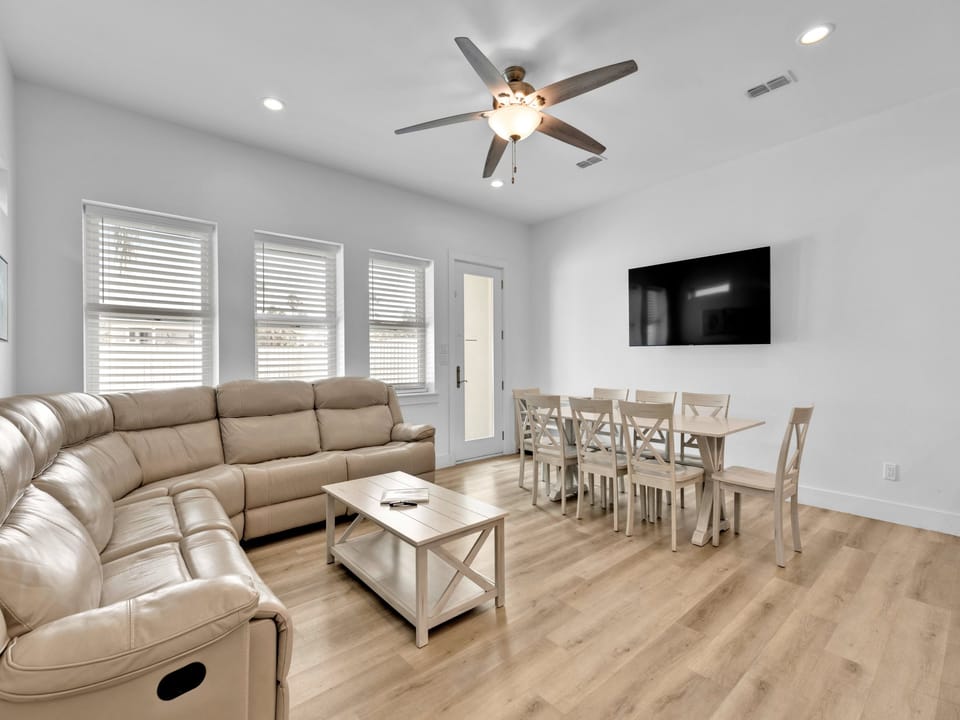 Ample seating surrounding a flat screen TV