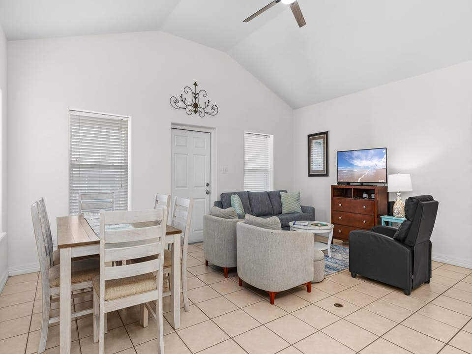 Open concept newly furnished living and dining area on the 2nd floor.
