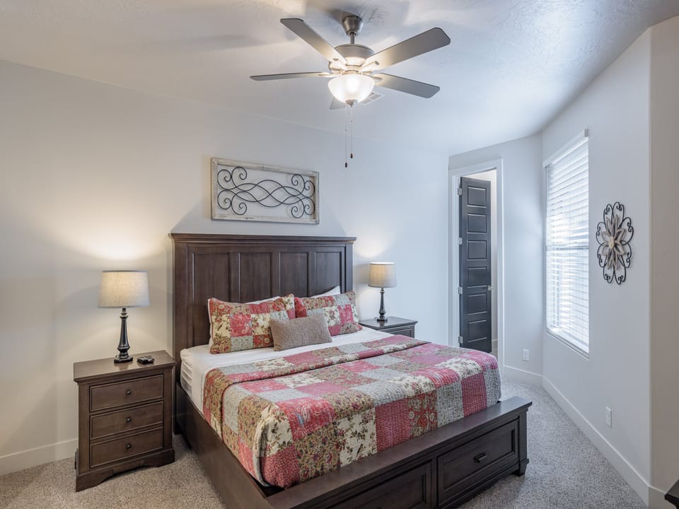 Retreat to your sanctuary of comfort in the main bedroom, featuring a luxurious king-size bed that promises nights of restful slumber and rejuvenation.