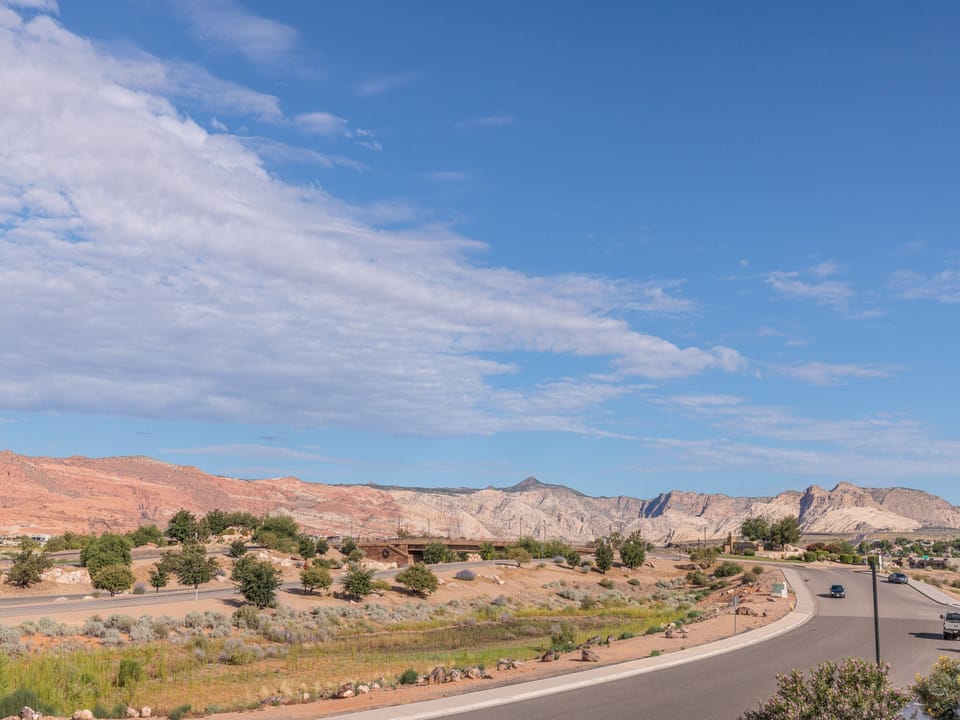 Beautiful balcony view of Snow Canyon's surrounding rock landscape.