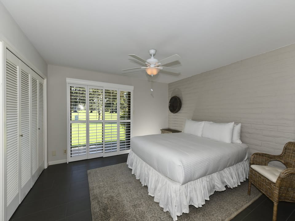 MASTER BEDROOM WITH VIEWS OF FAIRWAYS