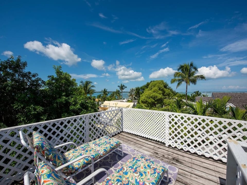 Roof top deck with ocean and town views.