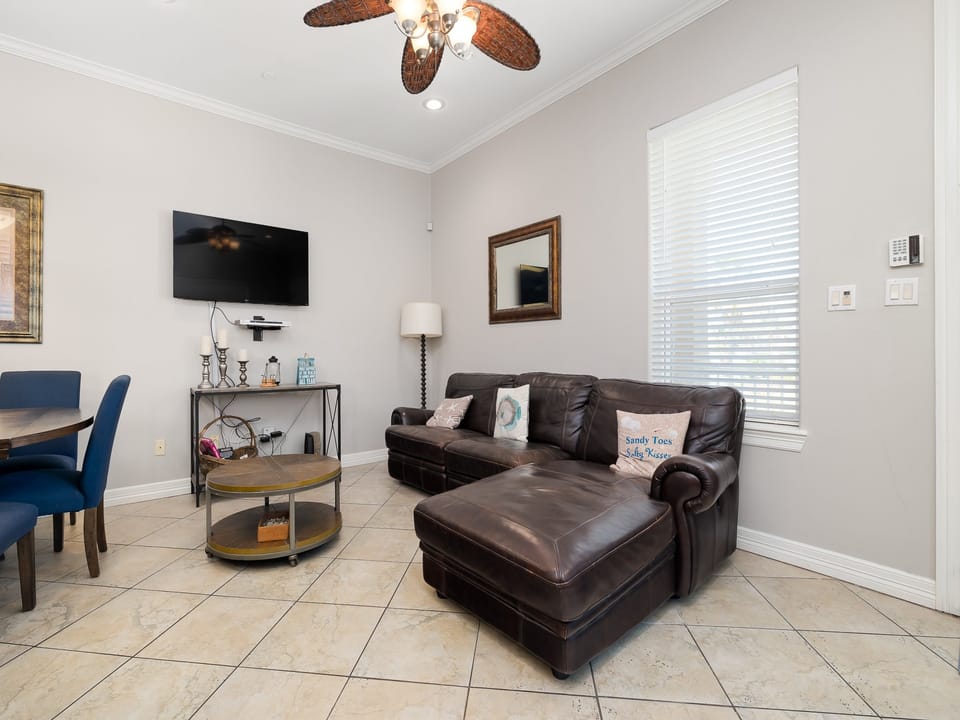 Living Area surrounding a flat screen TV to enjoy your favorite movie or show