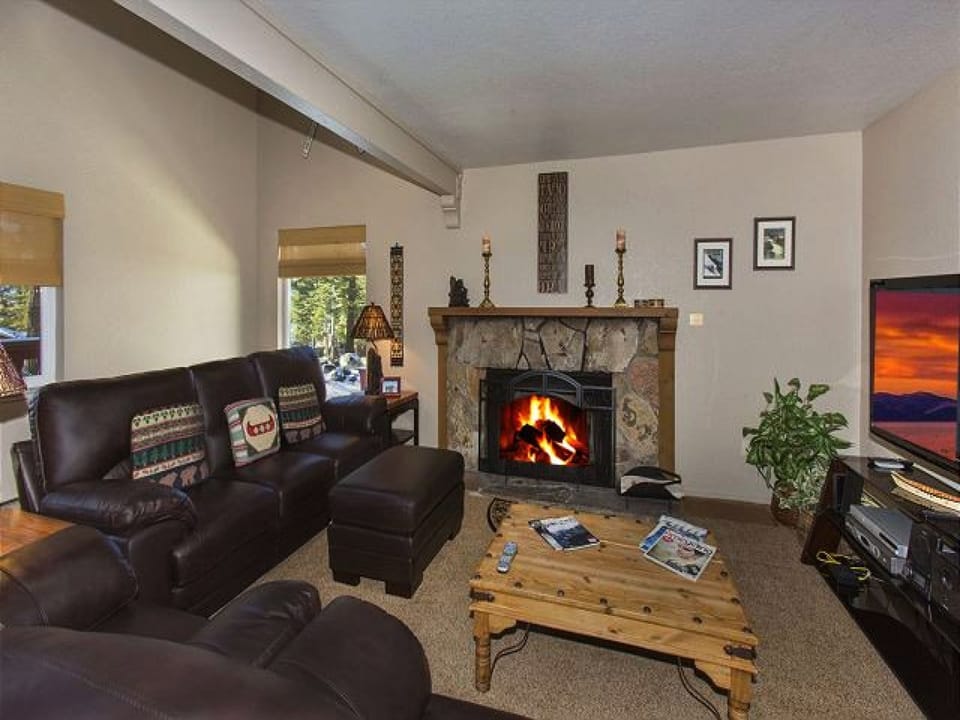Comfortable Living Room with Wood Burning Fireplace