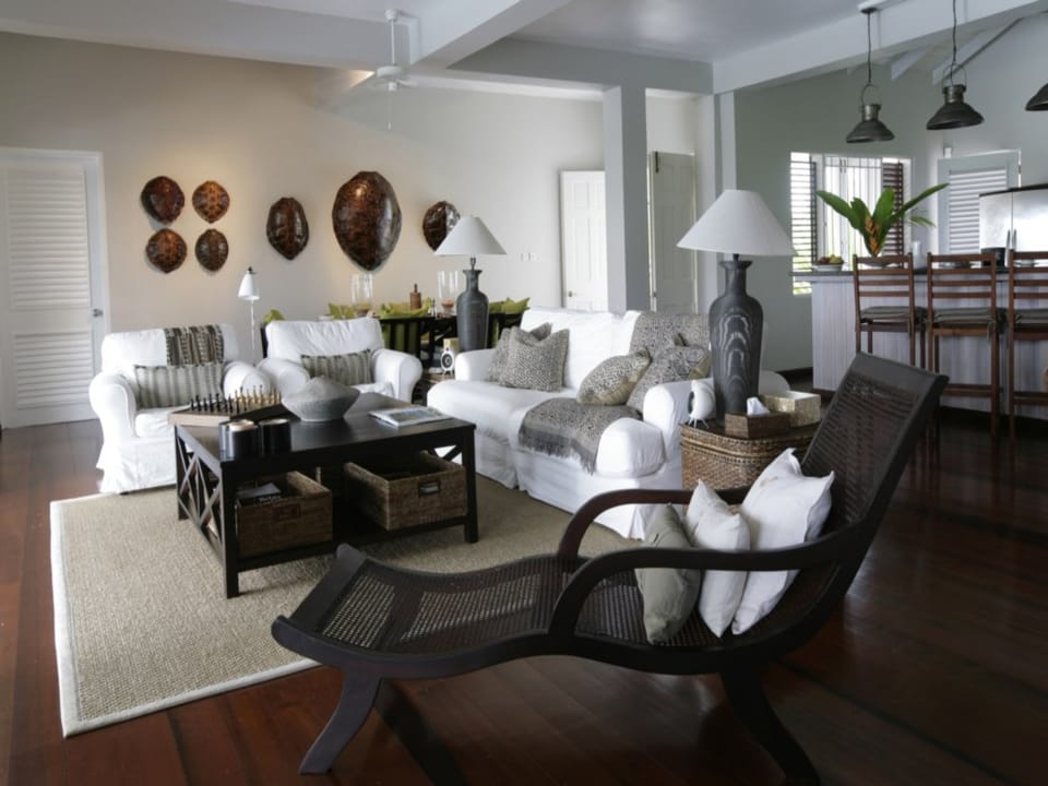 Living space looking over to dining near front door.