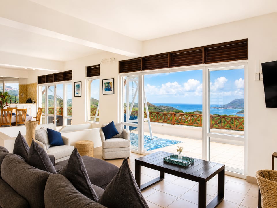 Large open plan living & dining room which opens up to a large patio with gorgeous views and cooling breezes.